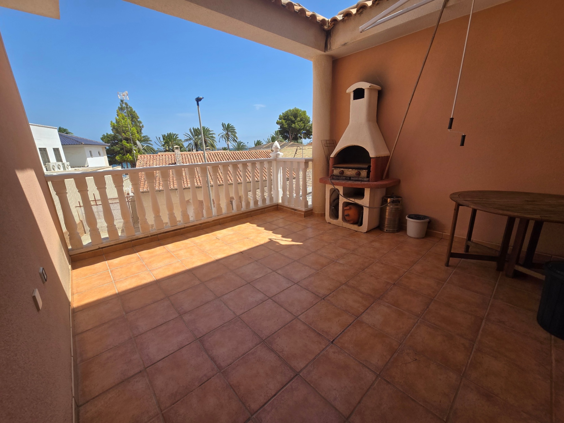 Covered terrace with BBQ